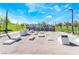 Modern outdoor fitness area with exercise equipment and stepping stones for an active lifestyle at 715 Drammatico Pl, Henderson, NV 89011