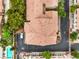 An aerial top-down view shows the condo's tile roof, nearby parking, and a glimpse of the community pool at 7450 S Eastern Ave # 2073, Las Vegas, NV 89123