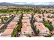 Serene aerial perspective of a well-maintained community with tree-lined streets and desert landscaping at 7450 S Eastern Ave # 2073, Las Vegas, NV 89123