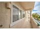 Balcony with neutral stucco, ample sunlight, and privacy blinds on the windows at 7450 S Eastern Ave # 2073, Las Vegas, NV 89123