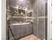 Modern bathroom features double sinks and glass enclosed shower at 7450 S Eastern Ave # 2073, Las Vegas, NV 89123