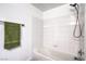 Bright bathroom features tiled shower and tub combination with modern fixtures at 7450 S Eastern Ave # 2073, Las Vegas, NV 89123