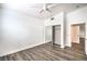 Clean bedroom featuring wood floors and closet with sliding mirror doors at 7450 S Eastern Ave # 2073, Las Vegas, NV 89123