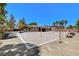 Backyard dog park featuring multiple dog play structures and plenty of space for pets to run and play at 7504 Via Sistina St, Las Vegas, NV 89131