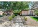 Charming single-story home with a well-maintained landscaped front yard and rock lawn at 7504 Via Sistina St, Las Vegas, NV 89131