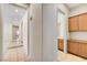 Tiled hallway with multiple rooms at 7504 Via Sistina St, Las Vegas, NV 89131