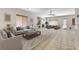Spacious living room features neutral color palettes, a fireplace, and great natural lighting at 7504 Via Sistina St, Las Vegas, NV 89131