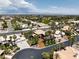 An aerial view showcases the property, set among mature trees and manicured landscaping, offering scenic views at 7520 Captains Harbor Dr, Las Vegas, NV 89117