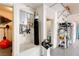 Garage interior features a water heater, water softener, and shelving for storing tools and other items at 7520 Captains Harbor Dr, Las Vegas, NV 89117