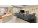 Open floor plan featuring a kitchen, living room, and dining space at 7520 Captains Harbor Dr, Las Vegas, NV 89117