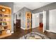 Study or office with hardwood floors and custom built in bookshelves at 7520 Captains Harbor Dr, Las Vegas, NV 89117