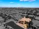A stunning aerial shot of the property, showcasing its tile roof and surrounding neighborhood at 7526 Gossamer Wind St, Las Vegas, NV 89139