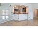 Features a built-in bar area with wood countertop and cabinetry, perfect for entertaining guests at 7526 Gossamer Wind St, Las Vegas, NV 89139