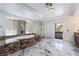 Spacious bathroom featuring a jacuzzi tub, glass shower, and marble flooring at 7526 Gossamer Wind St, Las Vegas, NV 89139