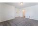 Bright bedroom with carpeted floors, neutral walls, closet, and ensuite bathroom at 7526 Gossamer Wind St, Las Vegas, NV 89139
