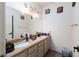 Bathroom features a double sink vanity with lots of counter space and great lighting at 7815 Windward Rd, Las Vegas, NV 89147