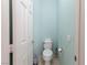 Efficient powder room with tiled floors, toilet, and modern fixtures at 7815 Windward Rd, Las Vegas, NV 89147