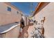 Side yard with storage for pool equipment and landscape items, offering a dedicated utility area at 7815 Windward Rd, Las Vegas, NV 89147