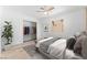 Bright bedroom featuring a comfortable bed, ample closet space, and a relaxing atmosphere at 7932 Diamond Rock Way # 101, Las Vegas, NV 89128