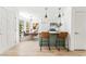 Welcoming foyer featuring an open concept kitchen and dining area at 7932 Diamond Rock Way # 101, Las Vegas, NV 89128
