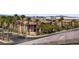 Scenic view of the community showcasing lush palm trees and well-maintained apartment buildings at 8016 Carpenter Creek Ave, Las Vegas, NV 89113