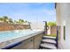 Relaxing hot tub featuring a swim spa option and a convenient access ladder at 8016 Carpenter Creek Ave, Las Vegas, NV 89113