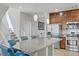 Spacious kitchen with a large center island, stainless steel appliances, and modern finishes at 8016 Carpenter Creek Ave, Las Vegas, NV 89113