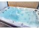 Top down close up of the luxurious swim spa and its hydrotherapy water jets at 8016 Carpenter Creek Ave, Las Vegas, NV 89113