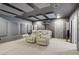 Modern theater room with comfortable seating, sound dampening features, and an impressive entertainment setup at 8016 Carpenter Creek Ave, Las Vegas, NV 89113