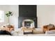 Cozy living room with a modern fireplace, comfortable seating, and stylish decor at 8140 Bay Harbor Dr, Las Vegas, NV 89128