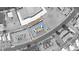 Aerial view of low-rise apartment complex with a central parking lot and surrounding greenery at 820 A Ave, Boulder City, NV 89005