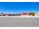 Well maintained low-rise apartment complex with red brick, pedestrian walkways and front parking at 820 A Ave, Boulder City, NV 89005
