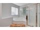 Bathroom showcasing a soaking tub and separate glass-enclosed shower at 8236 Bermuda Beach Dr, Las Vegas, NV 89128