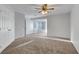 Bright, spacious bedroom featuring a ceiling fan and a bay window for natural light at 8236 Bermuda Beach Dr, Las Vegas, NV 89128