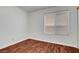 Empty room showcasing wood floors and a window at 8236 Bermuda Beach Dr, Las Vegas, NV 89128