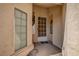 Welcoming front entryway featuring a glass window with a white door and a neutral color palette at 8236 Bermuda Beach Dr, Las Vegas, NV 89128