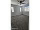 Bright bedroom with carpet and windows at 8928 Hand Painted Ct, Las Vegas, NV 89149