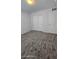 Bedroom featuring carpet, a closet, and a white door at 8928 Hand Painted Ct, Las Vegas, NV 89149