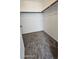 Walk-in closet with neutral walls and carpet and custom shelving at 8928 Hand Painted Ct, Las Vegas, NV 89149