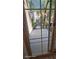 View of a private patio area enclosed by a fence, accessible through a sliding glass door at 8928 Hand Painted Ct, Las Vegas, NV 89149