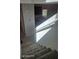 Carpeted stairway featuring natural light at 8928 Hand Painted Ct, Las Vegas, NV 89149