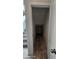Storage space underneath the stairs with tile flooring at 8928 Hand Painted Ct, Las Vegas, NV 89149