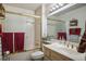 Bathroom featuring a bathtub with shower and a sink with vanity at 8929 Marble Dr, Las Vegas, NV 89134