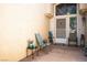 Charming front porch features tiled floors and sitting area at 8929 Marble Dr, Las Vegas, NV 89134