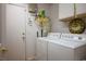 Laundry room is equipped with a full sized washer and dryer at 8929 Marble Dr, Las Vegas, NV 89134