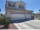 Well maintained home with a spacious 3-car garage, and desert landscaping at 9232 Marlia St, Las Vegas, NV 89123