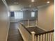 A bright hallway features updated flooring, fresh paint, and shuttered windows at 9232 Marlia St, Las Vegas, NV 89123