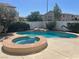 An inviting backyard features a custom pool, spa, and mature landscaping at 9232 Marlia St, Las Vegas, NV 89123