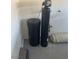 A home utility room features a water softener and water filtration system at 9232 Marlia St, Las Vegas, NV 89123