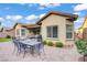 Backyard featuring desert landscaping, covered patio, seating area, and hardscape at 961 Cutter St, Henderson, NV 89011